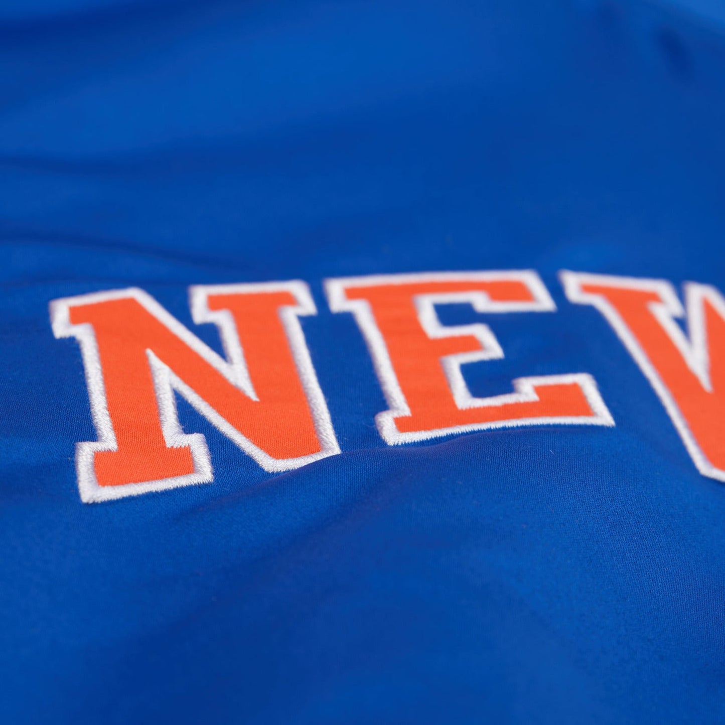 Mitchell & Ness Knicks Team Origins Royal/Orange Satin Jacket