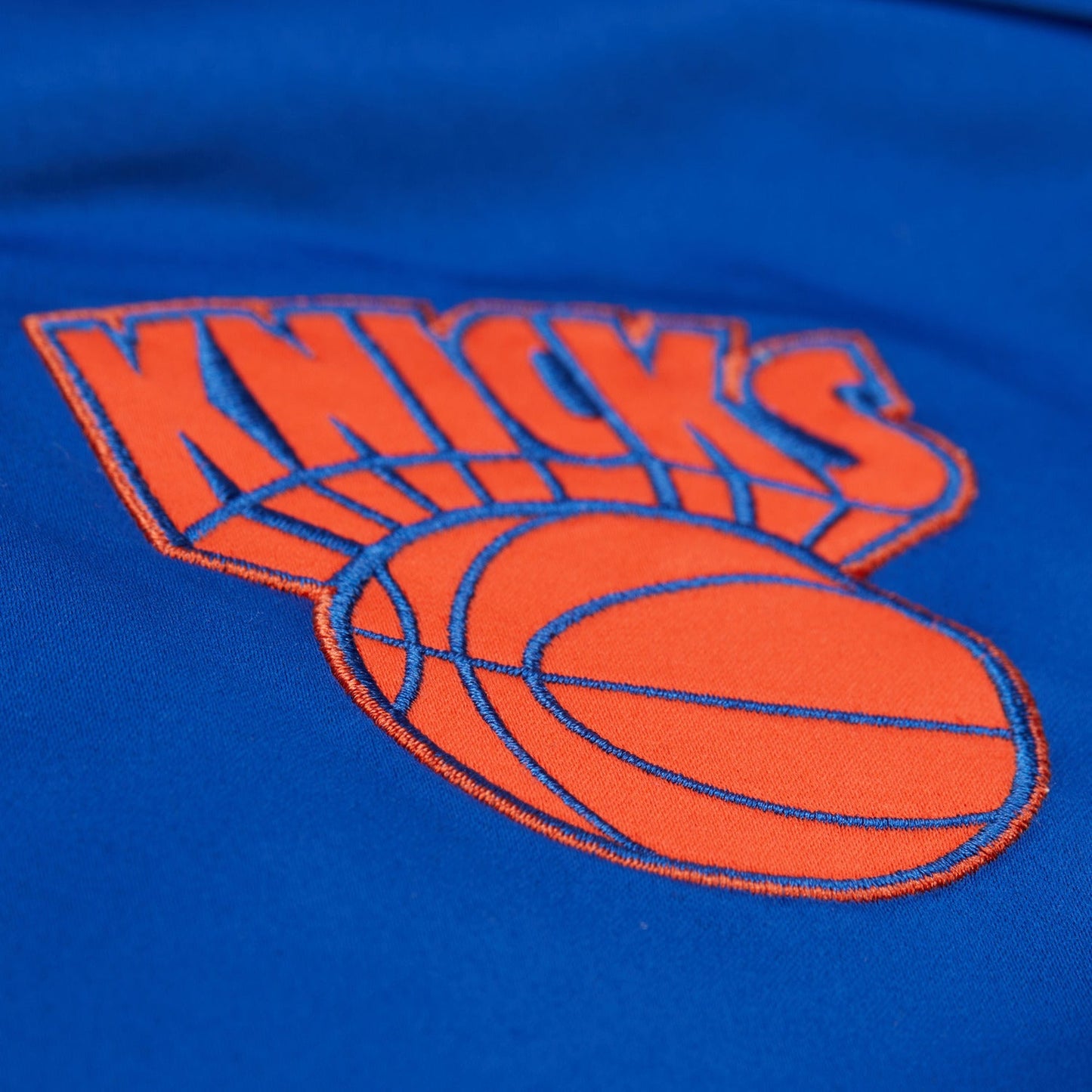 Mitchell & Ness Knicks Team Origins Royal/Orange Satin Jacket
