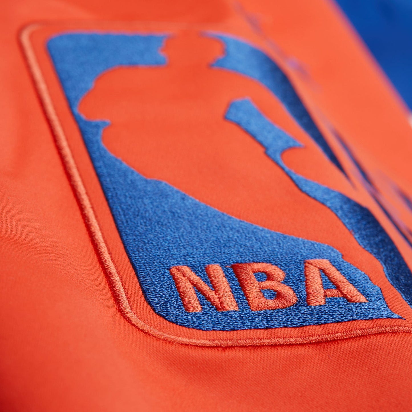 Mitchell & Ness Knicks Team Origins Royal/Orange Satin Jacket