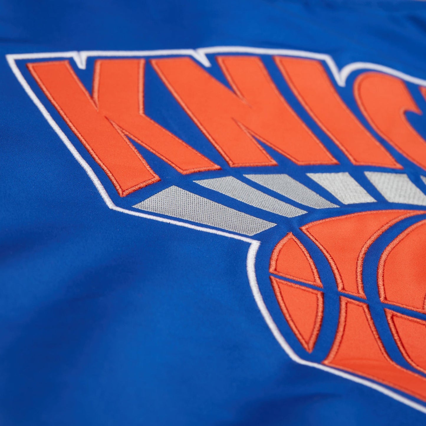 Mitchell & Ness Knicks Team Origins Royal/Orange Satin Jacket